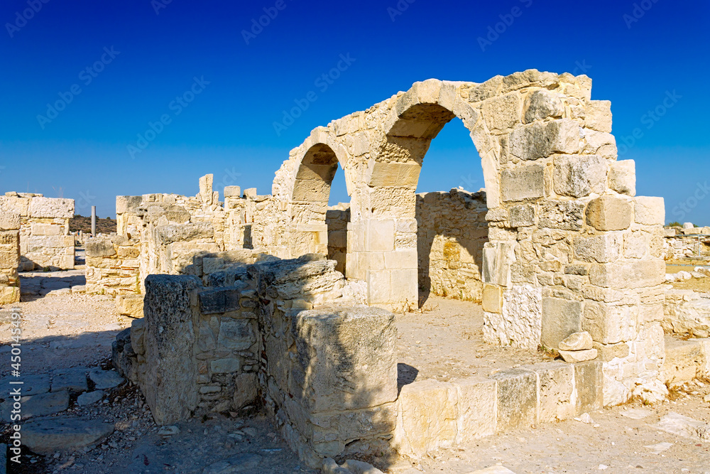 Cyprus, Limassol - 29 June 2021. Episcopal territory of the ancient city of Kourion. Wall with arches near the early Christian basilica.