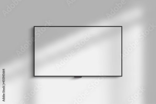 4k tv hanging on the wall