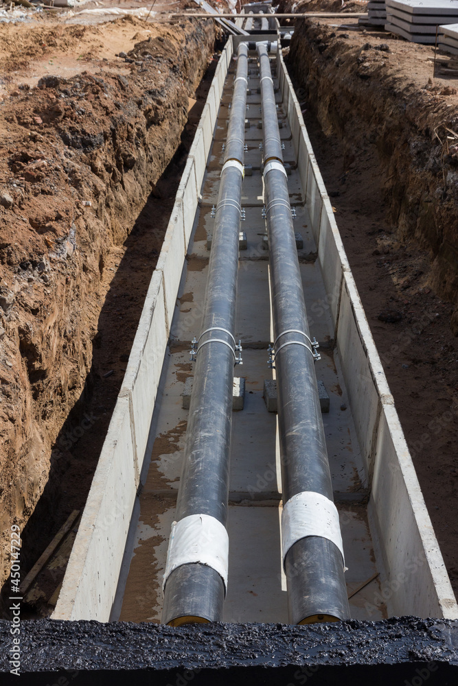 Pipeline construction. Installation of new plastic pipes for water. New