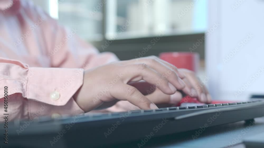 4k. slow motion of camera slide close up female hands of business woman using typing on keyboard computer pc at home office desk. Freelancer working online with pc. Marketing and financial concept.
