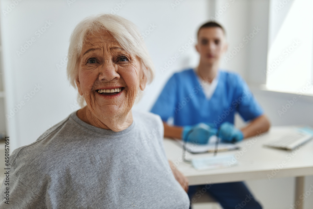 cheerful old woman at the hospital receiving a doctor communication consultation cheerful old woman at the hospital receiving a doctor communication consultation