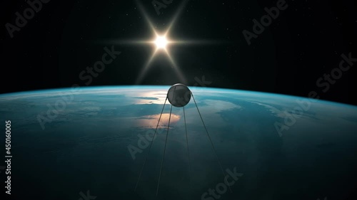 Satellite Sputnik 1 in space in orbit above the Earth. 3D rendering of the first artificial satellite orbiting Earth.  photo