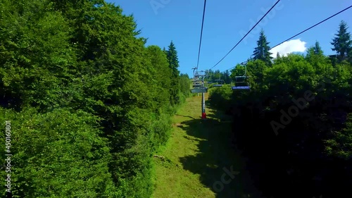 Accelerated chairlift ride, Bukovel, Carpathians, Ukraine photo