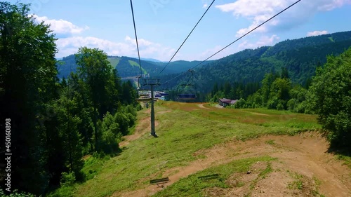 Ride over the gentle green mountain slopes, Bukovel, Carpathians, Ukraine photo