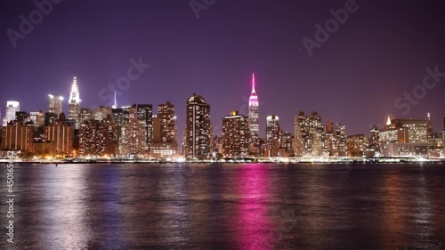 night view on manhattan and pink light empire state building 4k timelapse from new york
