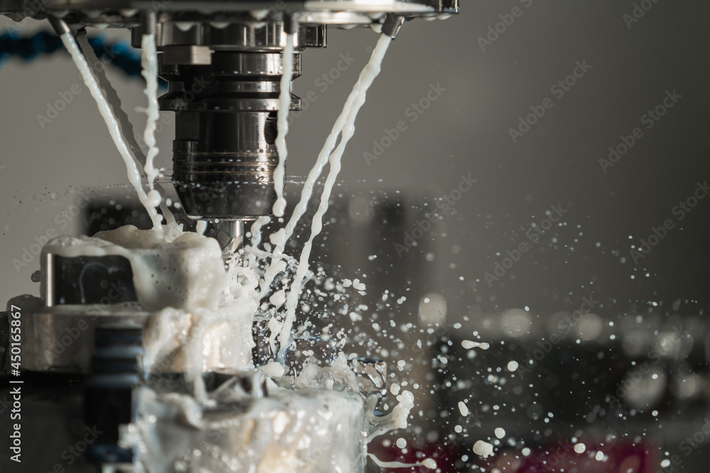 End mill being flooded in metal working lubricant End mill being flooded in metal working lubricant