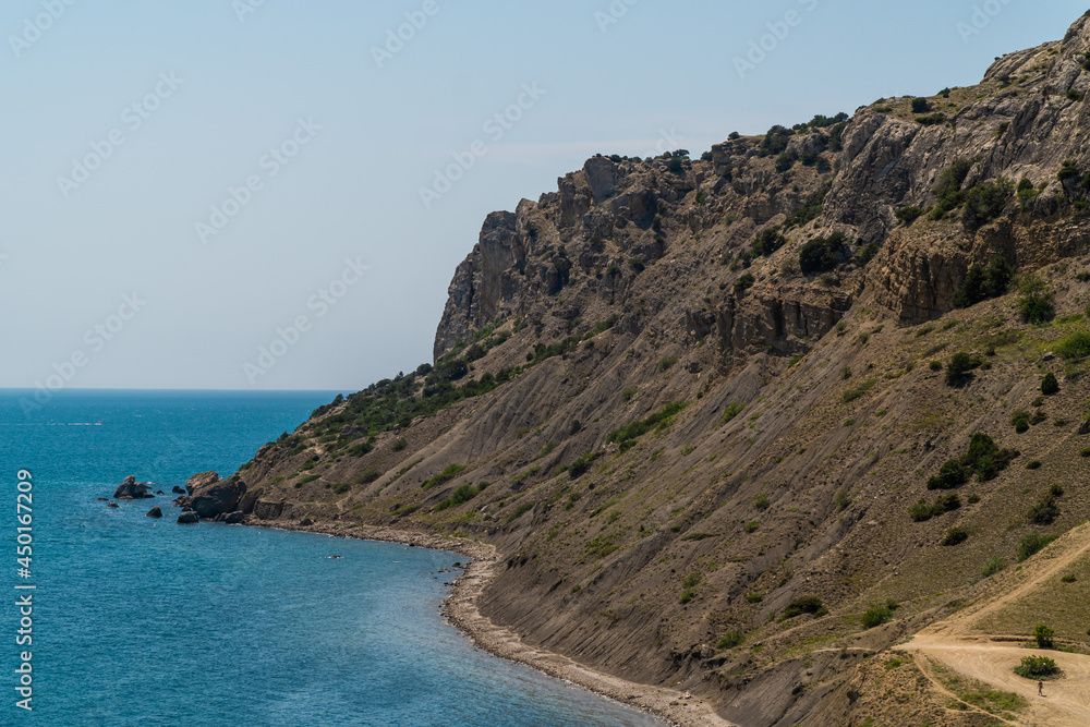 The Republic of Crimea. July 11, 2021. Mount Alchak near the city of Sudak. The Republic of Crimea. July 11, 2021. Mount Alchak near the city of Sudak.