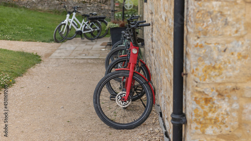 Bikes lined up against a wall