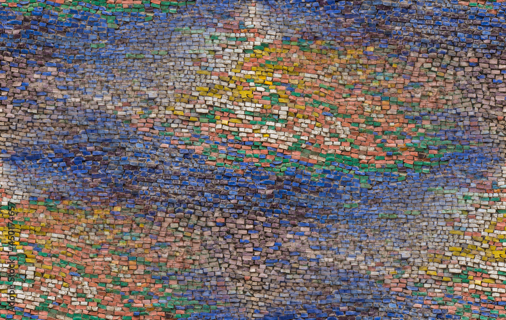 Seamless mosaic texture made of colored stones.