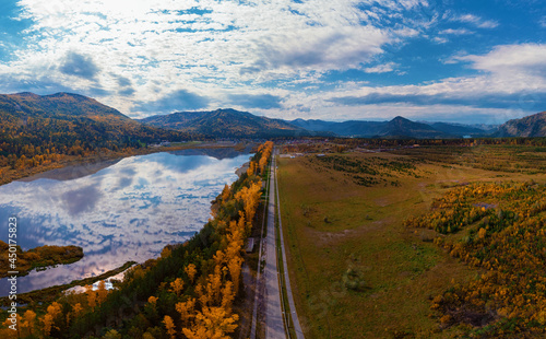 Aerial view of road and lak...