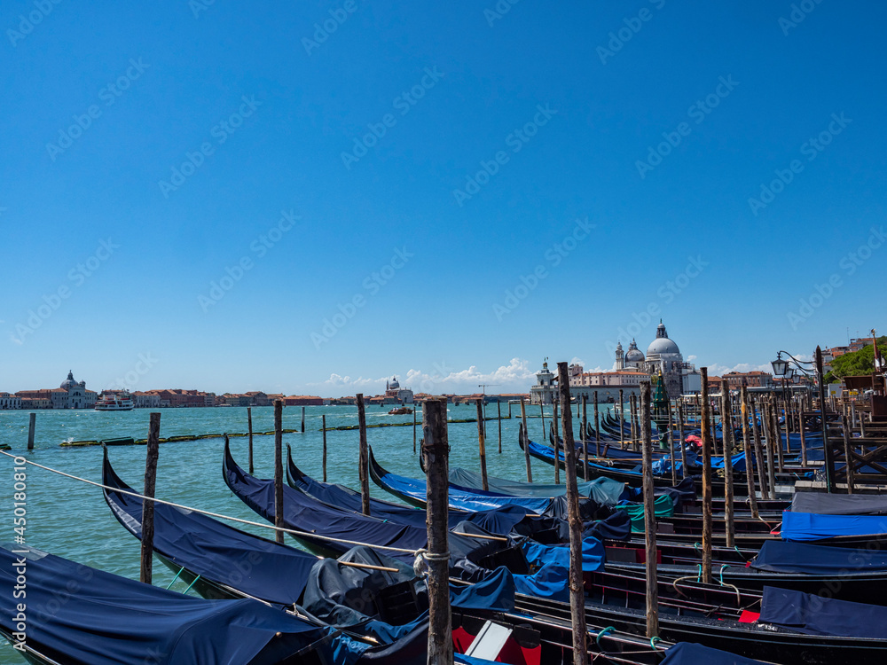 Gondolas moored in a Venice canal