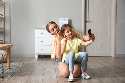 Young woman and her little ...