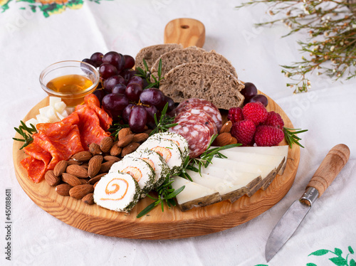 Fotografering High Angle View Of A Grazing Cheese Board Served On Table