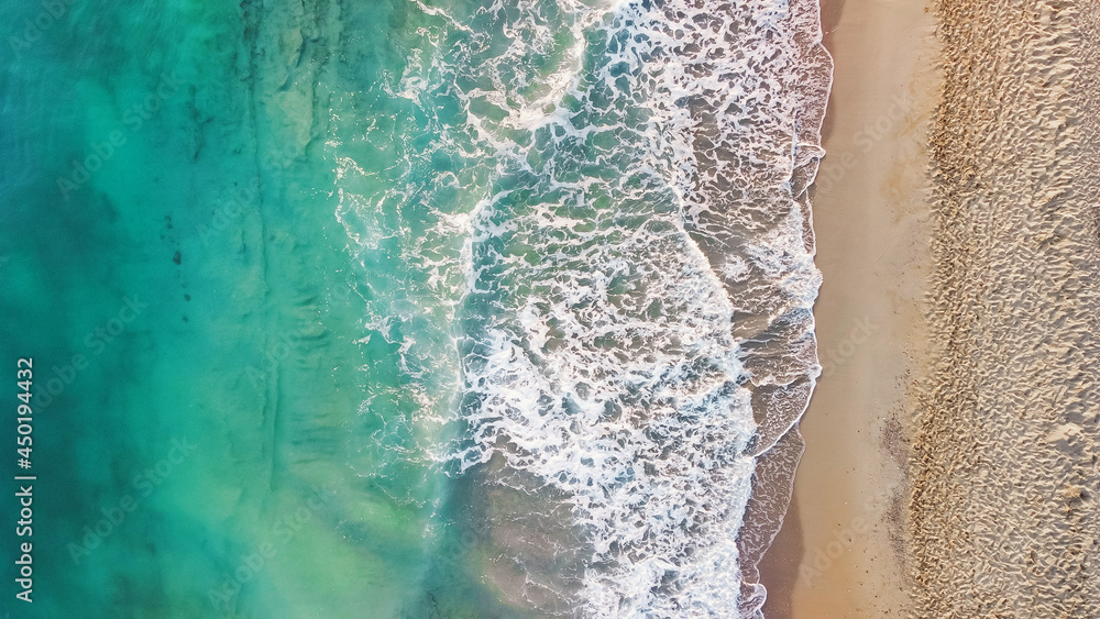 Aerial from drone of an stunning beautiful sea landscape beach with turquoise water at sunrise. Free copy space. Aerial from drone of an stunning beautiful sea landscape beach with turquoise water at sunrise. Free copy space.