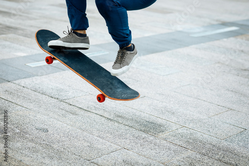 Skateboarder skateboarding outdoors in city