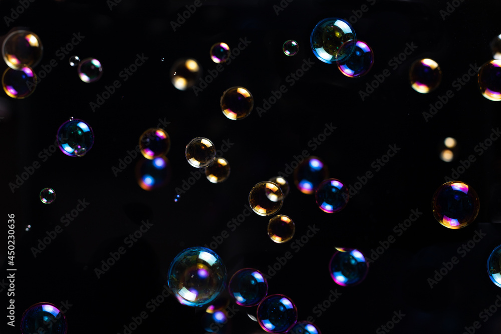 Colorful bubbles on black Colorful bubbles on black