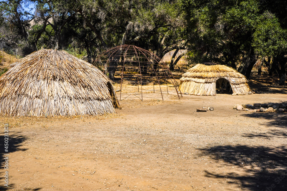 Historical Native American Indian Chumash village with homes and frames Historical Native American Indian Chumash village with homes and frames