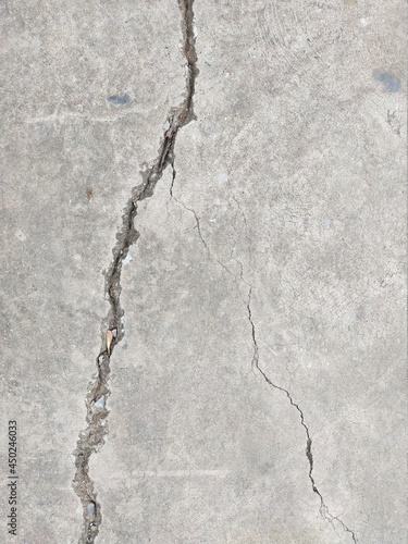 Components of large buildings cracked due to non-standard construction.
