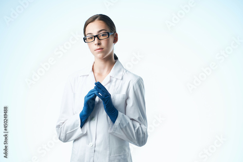 female doctor emix white coat follow light background photo