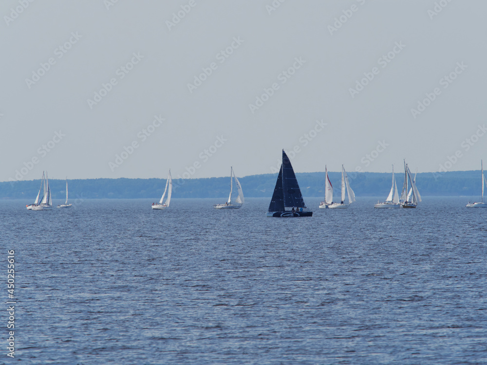Fototapeta premium Sailing yacht in Mediterranean sea at sunset. Travel and active lifestyle concept