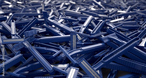 Pile of unrecycled plastic disposable blades. 