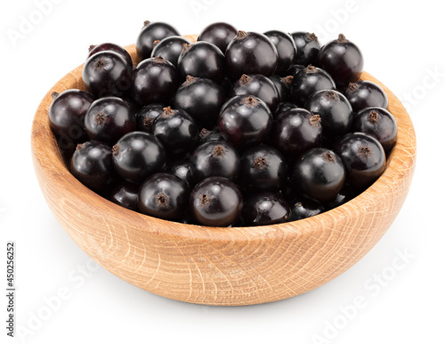 Wallpaper Mural black currant in wooden bowl isolated on white background. macro. clipping path Torontodigital.ca