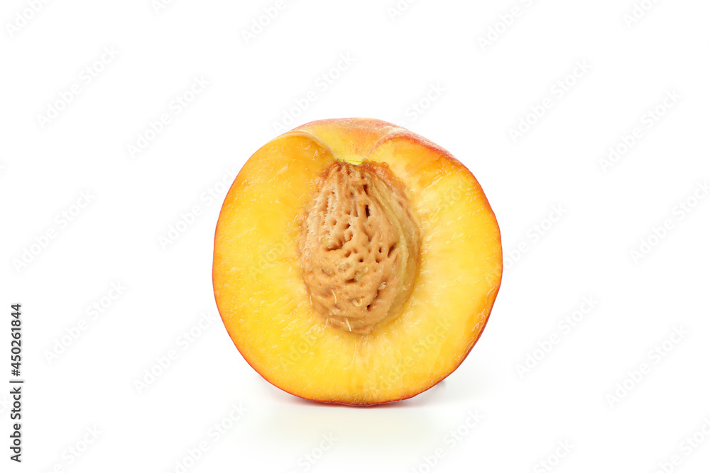 Half of peach fruit isolated on white background