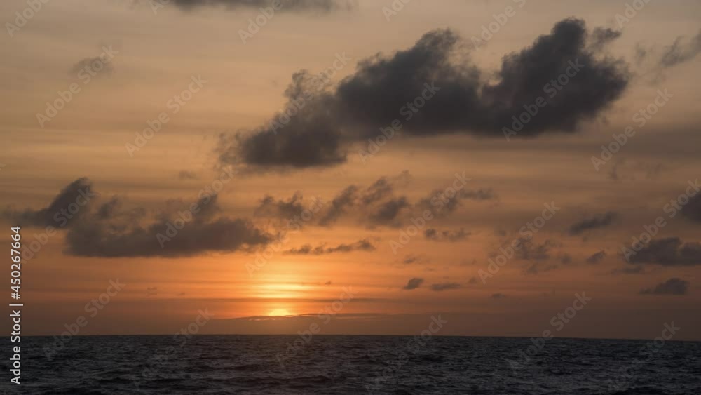 Timelapse. Big bright Yellow sun with Clouds moves down. Awesome landscape of sky and silhouette Timelapse. Big bright Yellow sun with Clouds moves down. Awesome landscape of sky and silhouette