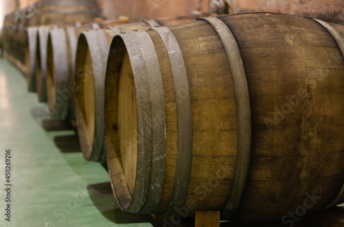old wooden wine barrels in a wine press
