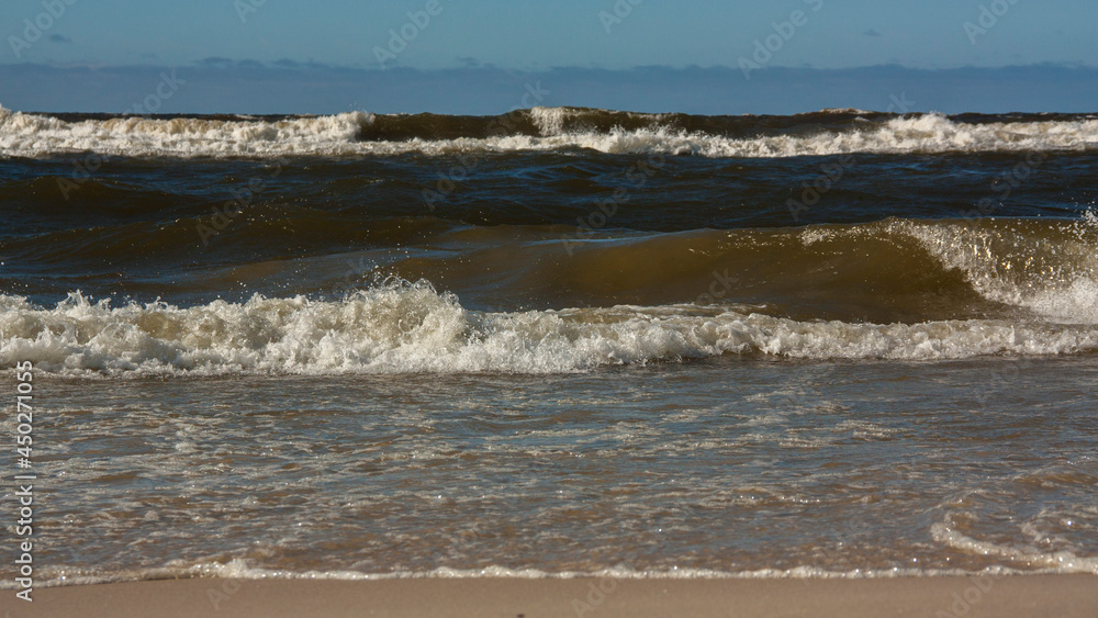 strong waves on the shores of the baltic sea in sunny weather strong waves on the shores of the baltic sea in sunny weather