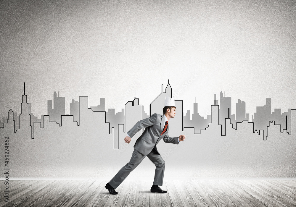 King businessman in elegant suit running and drawn cityscape silhouette at background