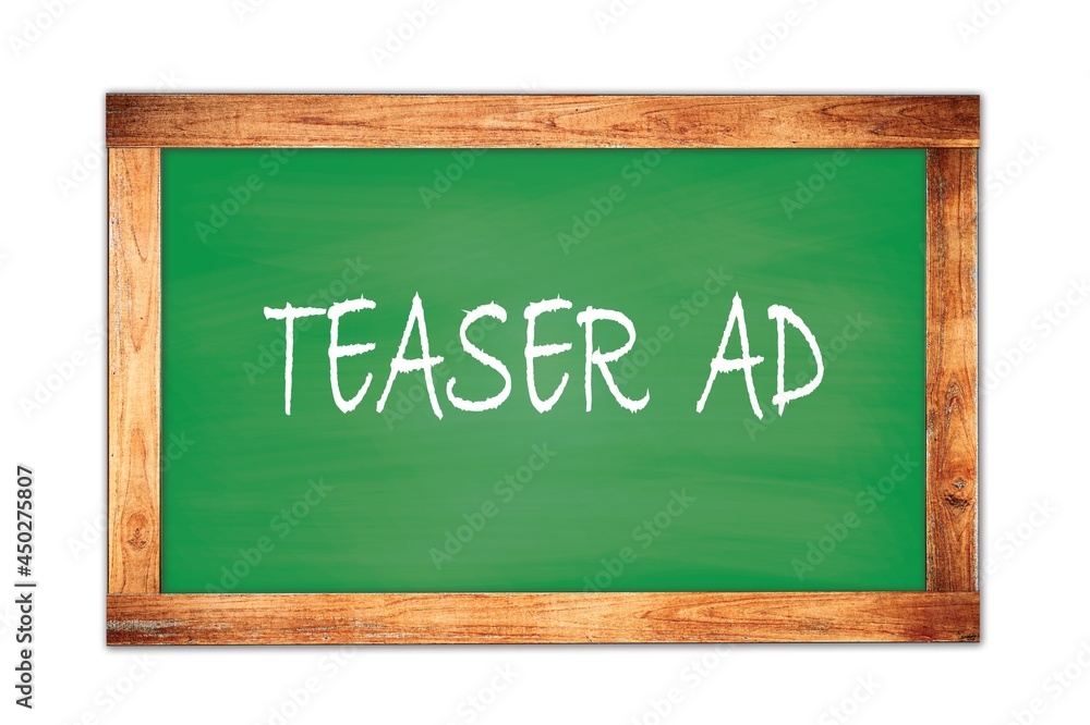 TEASER AD text written on green school board. TEASER AD text written on green school board.