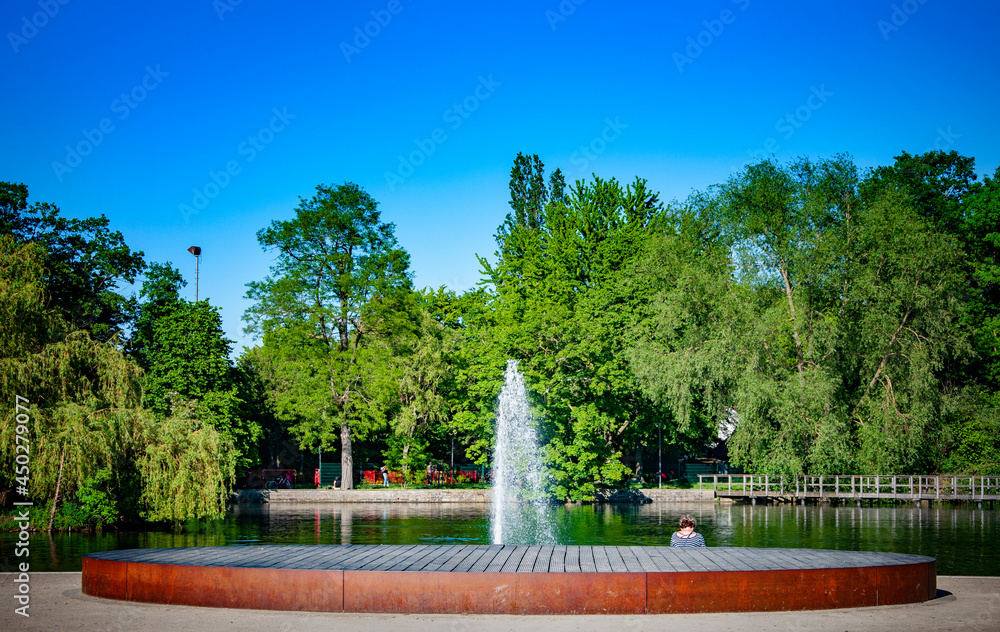 BUNDE, GERMANY. MAY 31, 2021. Fountain on the lake