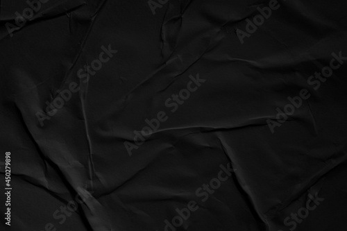 Weathered black paper texture background photo