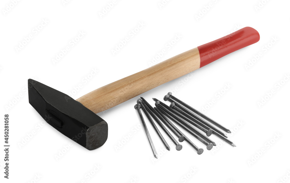 Hammer and metal nails on white background Hammer and metal nails on white background