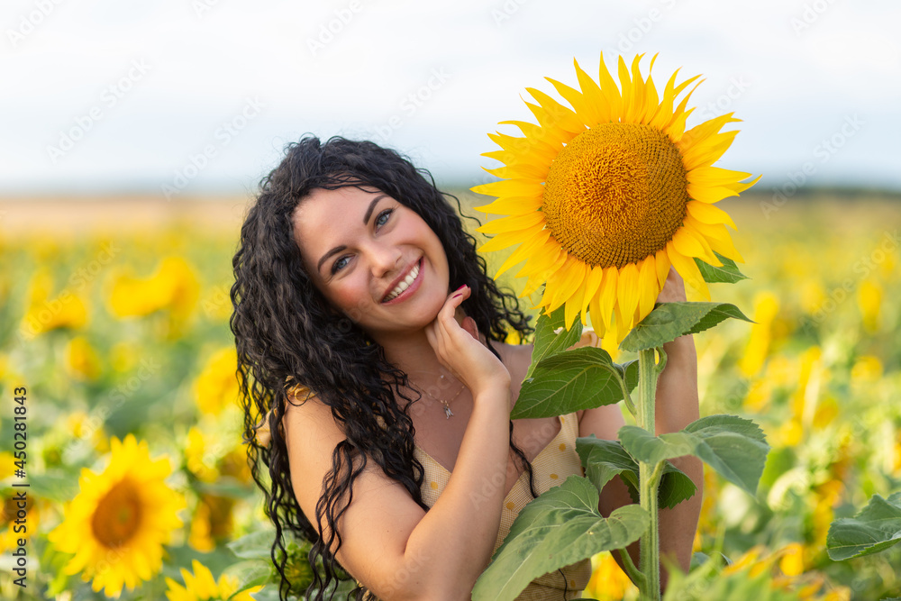 Portrait of a beautiful smiling dark-haired woman Portrait of a beautiful smiling dark-haired woman