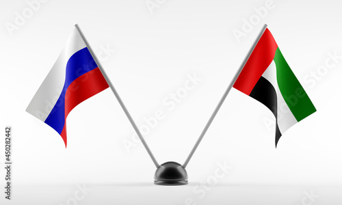 Stand with two national flags. Flags of Russia and United Arab Emirates. Isolated on a white background. 3d rendering