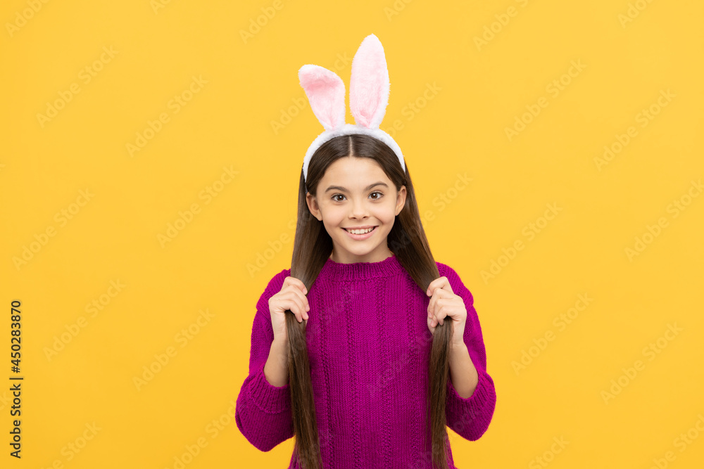 cute rabbit. easter spring holiday. happy teen girl wear bunny ears. happy easter