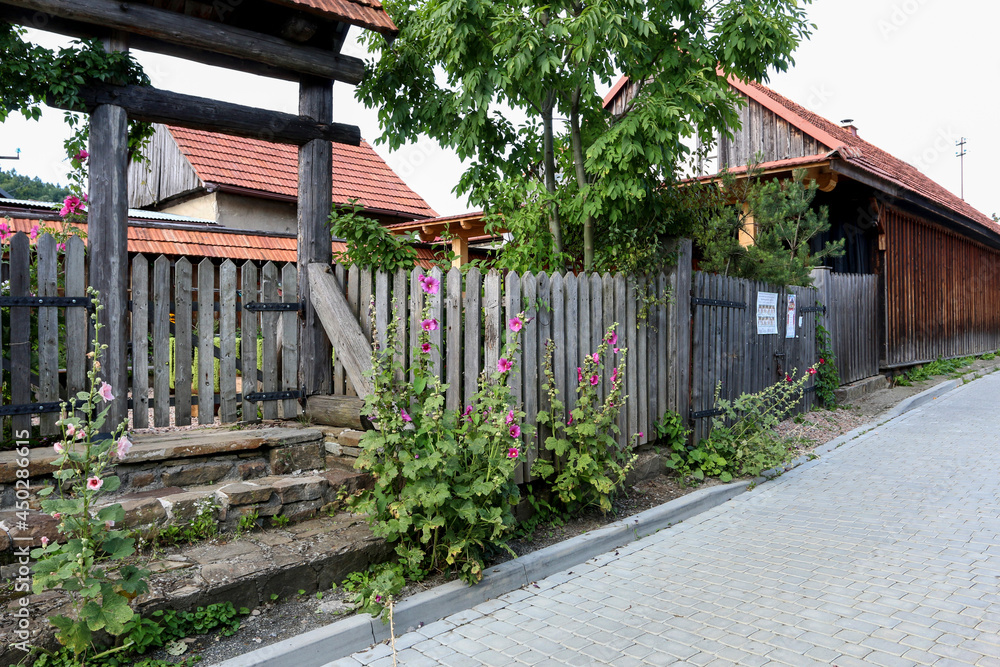 LANCKORONA, POLAND - AUGUST 09, 2021: Wooden architecture inscribed on UNESCO world heritage list LANCKORONA, POLAND - AUGUST 09, 2021: Wooden architecture inscribed on UNESCO world heritage list