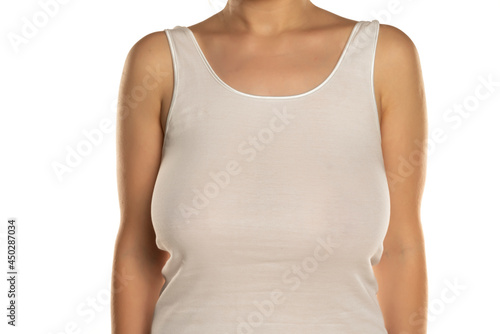 a woman with big breasts without a bra in a white shirt Photos