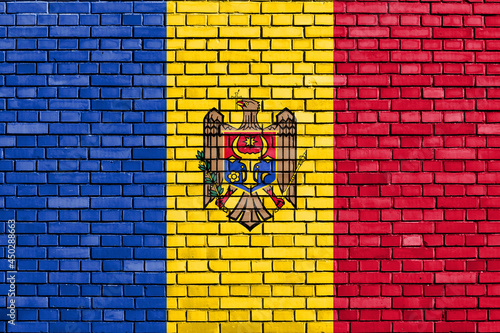 flag of Moldova painted on brick wall