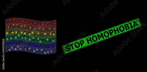 Glowing mesh net waving LGBT flag with glowing spots, and grunge Stop Homophobia rectangle watermark. Green rectangle Stop Homophobia grunge stamp.