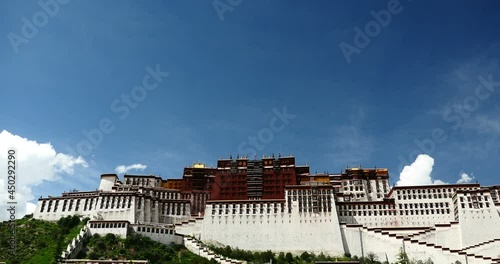 4k white puffy cloud mass rolling over Potala in Lhasa;Tibet. photo