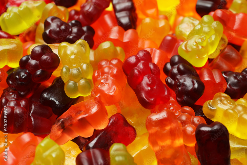 Delicious gummy bear candies as background, closeup Delicious gummy bear candies as background, closeup
