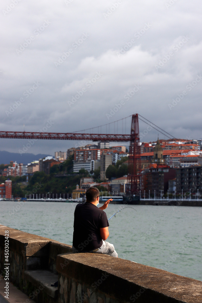 Fishing in the estuary of Bilbao