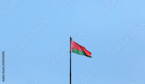 belarusian state flag on a blue sky