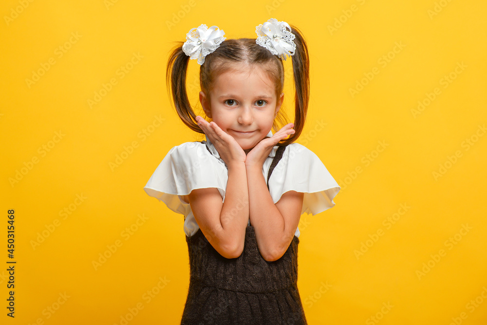 Close up photo of oud girl, portrait with different emotions, isolated yellow color background Close up photo of oud girl, portrait with different emotions, isolated yellow color background