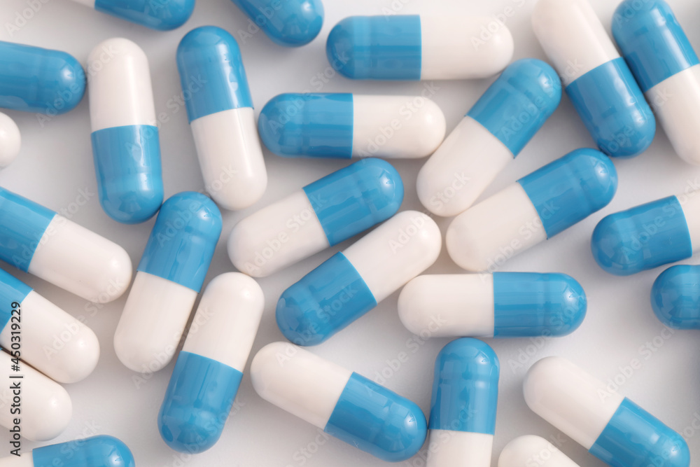 pills capsules close up on top view isolated in white background