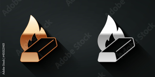Gold and silver Molten gold being poured icon isolated on black background. Molten metal poured from ladle. Long shadow style. Vector