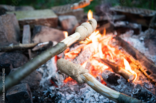 Stick bread around the campfire
